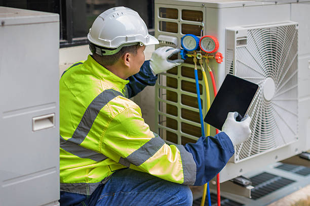 Professional Air Conditioning Repair technician working in Sherrill, NY